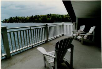 Summer calm: A Lake Joseph view of the island boat house designed by Elizabeth deJong