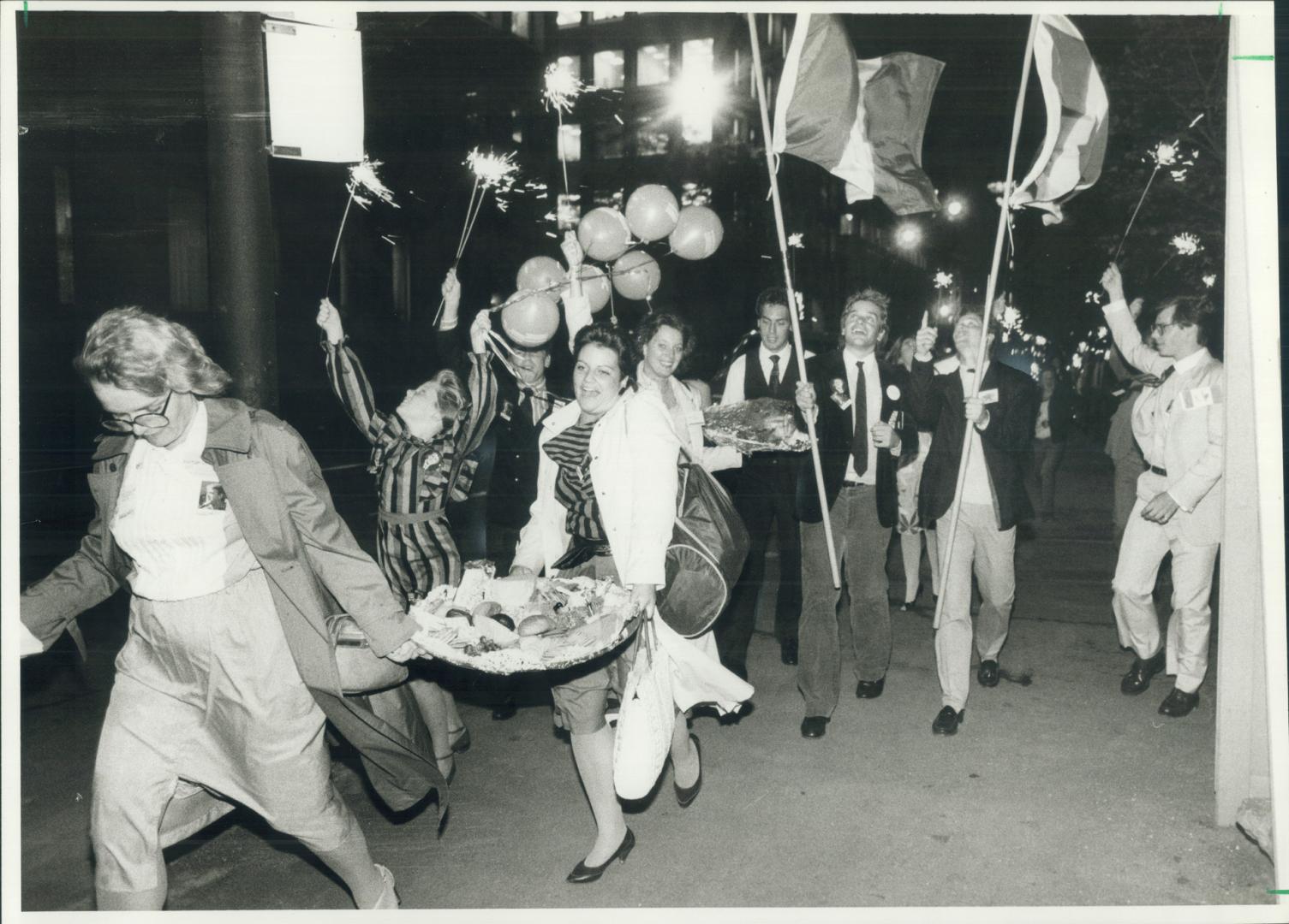 We won! Cheering Tory supporters staged an impromptu victory parade last night in downtown Toronto, wending their way from PC Metro headquarters on We(...)