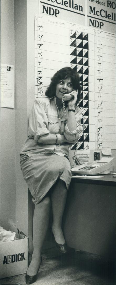 Wendy Cuthbertson handles a call at headquarters of NDP candidate Ross McCleilan in Bellwoods riding