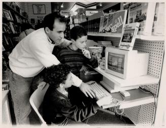 Mastermind's John Levy coaches customers Andrew Carrington, at the keyboard, and Karl Keating