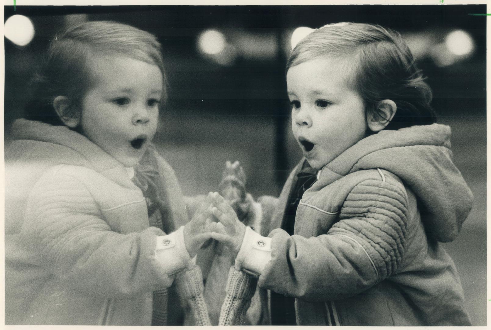 Oh mommy, look at that! Alison Klein, 2, was peeking into the Christmas windows at the Simpson's store at Yonge and Queen last weekend and she liked w(...)