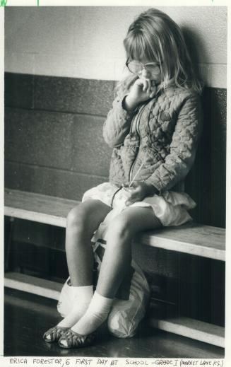 The first day of school. Looking a bit forlorn, 6-year-old Erica Forester sits on a bench at Market Lane Public School on Lower Jarvis St. yesterday a(...)