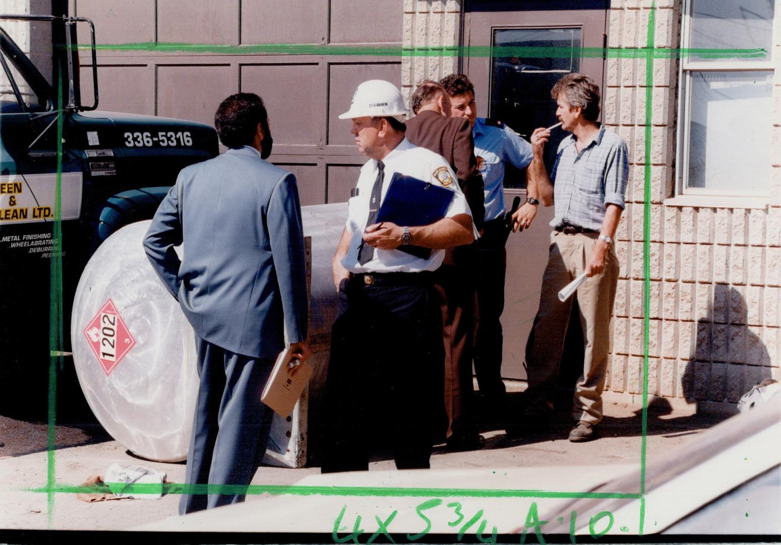 Fetal Explosion: Tony Matkovich, who escaped injury yesterday in Burlington, talks to Halton police Sergeant Joe Martin