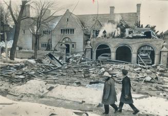 Rosedale mansion of F. William Nicks, president of the Bank of Nova Scotia, was damaged by an explosion this morning. It blew out windows and cut off (...)