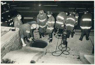 A Ruptured oil line in this Ontario Hydro manhole at Eglinton Ave