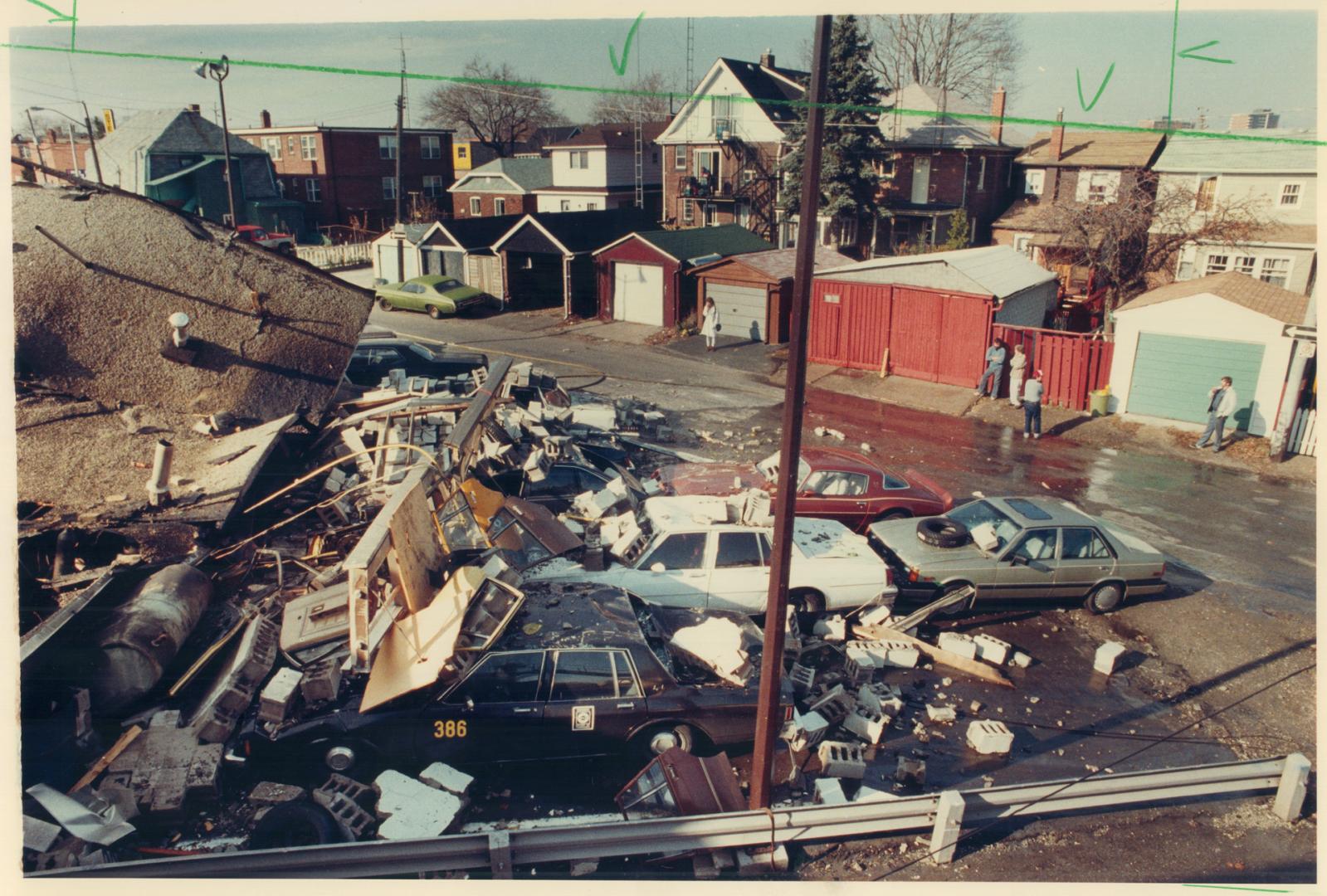 Propane explosion wrecks service station, Cars sit in the rubble of the Malhi Auto Services garage on Weston Rd