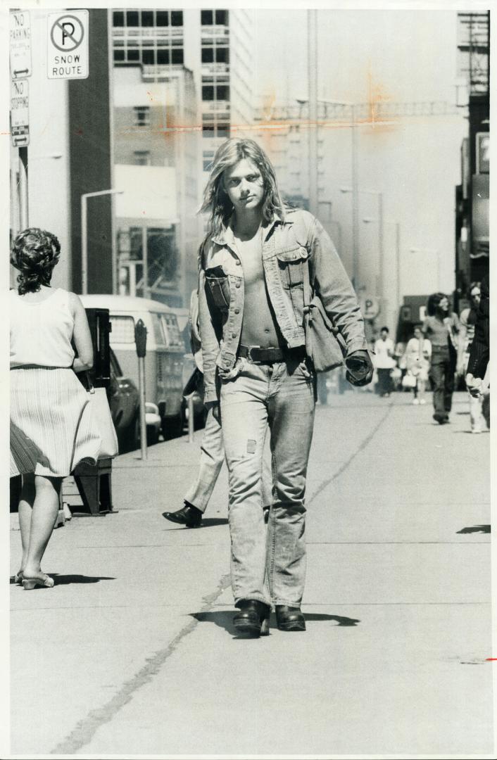 Bare-Chested Alan Aring strolls along Bloor St