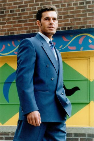 Top, left to right: Steel blue double-breasted suit, $425, white dress shirt, $55, and silk tie, $45, all from Heritage Fine Clothing