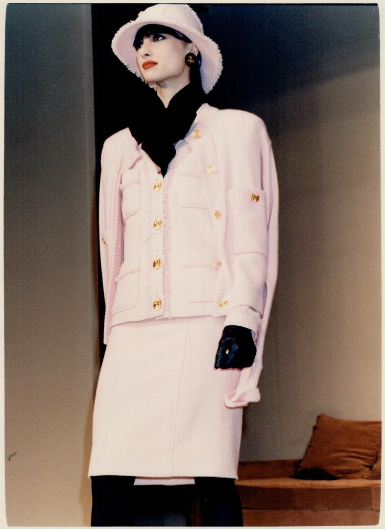 Chanel suit: Left, jackets and skirts were cut close to the body, giving them a sexy, chic look that was classical yet modern