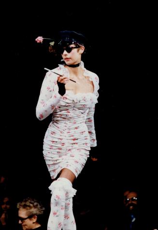 Sweet shirring: Above, Betsey Johnson's flowered, lace-trimmed shirred white dress