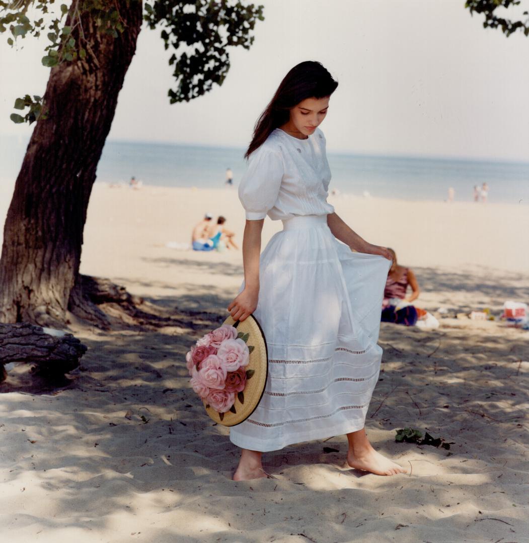 Right, fitted white cotton blouse, $38, and white cotton skirt, $58, La Cache