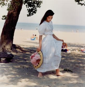 Right, fitted white cotton blouse, $38, and white cotton skirt, $58, La Cache