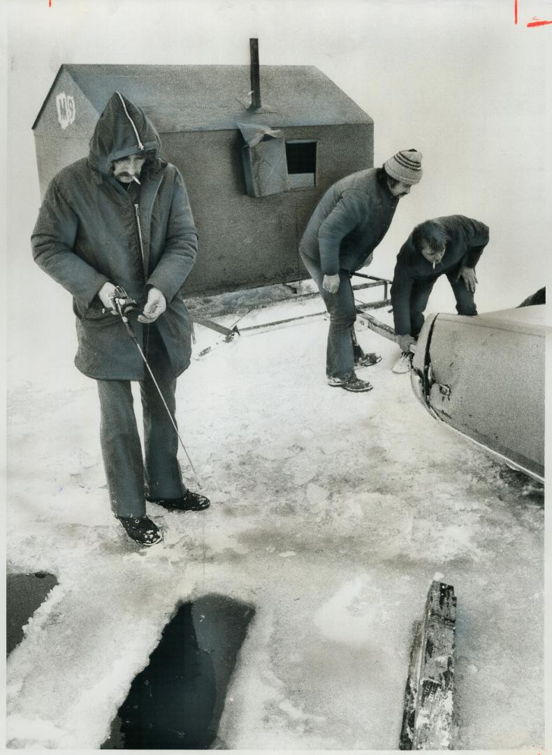 Winding up the season. Ice fishing huts, by law, must be off lakes by the end of March, so the last of them were being removed from Lake Simcoe near J(...)