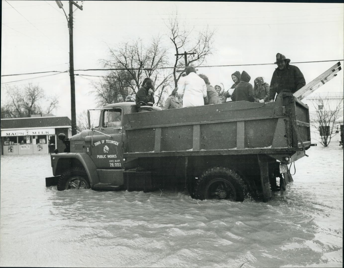 Residents leave for higher ground, More than 85 familys on one street alone had to flee their homes in the wake of flood waters from Lake St. Clair