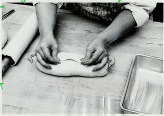 Seal the edge of roll, Pinch dough together to seal firmly