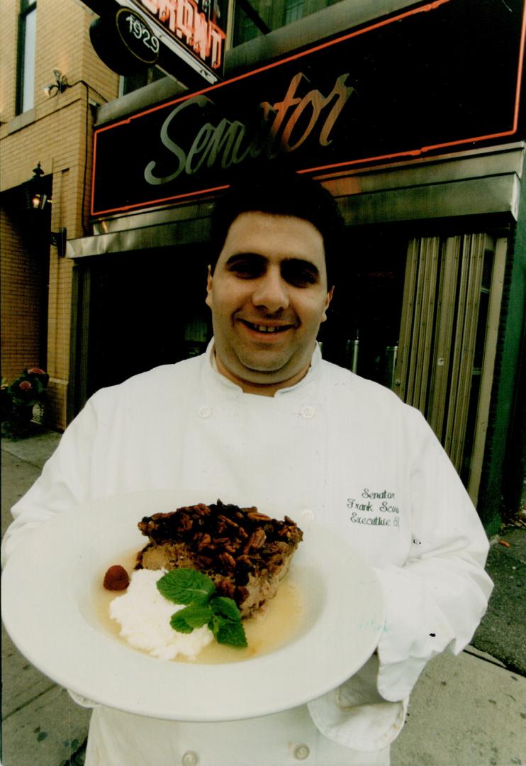 Prize pud: Frank Scordino of the Senator Restaurant adds loads of fruit and nuts to his dessert