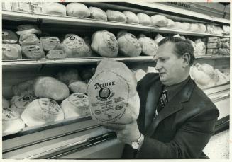 Chester Wilcox, chief merchandiser for Dominion Stores, is the man who decided 10 months ago how many turkeys his chain would need for Christmas. He s(...)