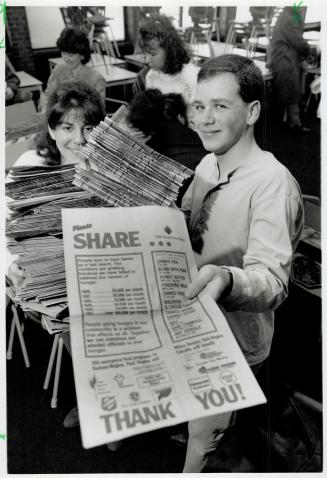 Students fold 100,000 food bags, Jason Silverman and Lesley Wiesenfeld of Thorniea Secondary School in Thornhill show off their efforts yesterday in t(...)