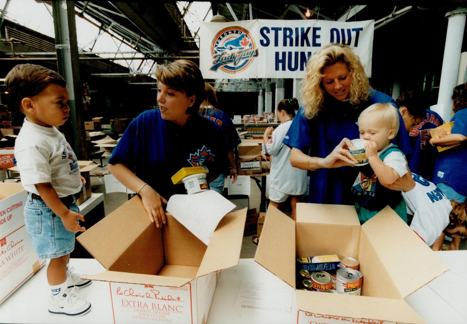 Cathy Garcia (l) son C. J., Dawn Timlin son Jacob