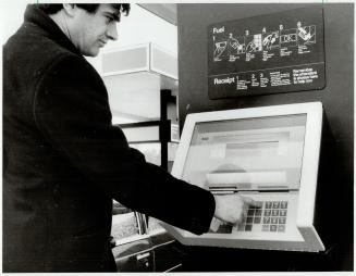 High-tech gas bar: Esso is testing an automated system of selling gas at one Metro station with a credit-card machine that operates like a bank cash dispenser