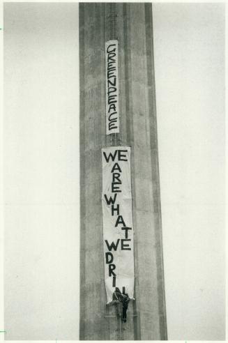 Greenpeacers up a stack. Climbers Steve Loper (left) of Chicago and Kenn Hollis of Toronto today scaled the 250-foot smokestack at Metro's Highland Cr(...)