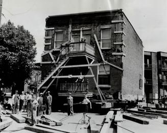 Eleven Families occupying two blocks of houses in the Montreal suburb of Verdun are staying right in the premises as the buildings are moved to anothe(...)