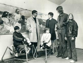 About to be Evicted from their home, Lois Lewis and four of her children look at the house offered them for the summer by St. David's Anglican Church.(...)