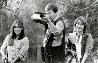 Taking aim: John Shields, president of the Appleby and District Gun Club, believes trap shooting is a family sport, and daughters Tracy, 12 (left), and Tricia, 14, would seem to agree