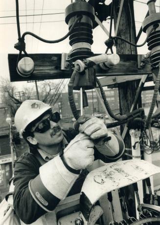 View? what view?, The good news about working as a Toronto Hydro Lineman like Steve Ruscitti is the great vistas of Toronto neighborhoods from the raised bucket he works in all day