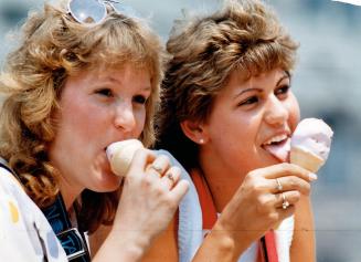 Left, Kristi Boomsma and smiling Laurie Brower of Grand Rapids, Mich