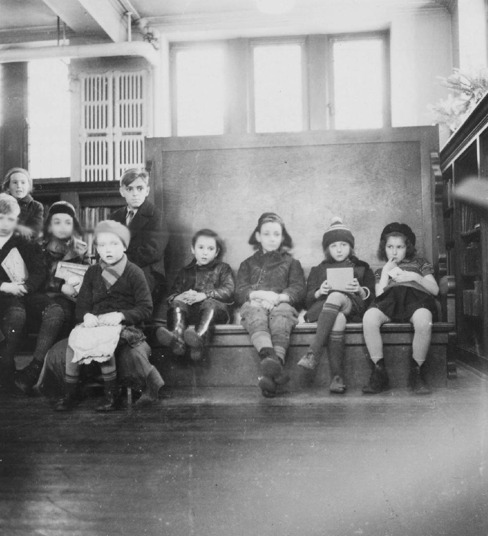 Image shows children inside the Boys and Girls Room at Wychwood Library.