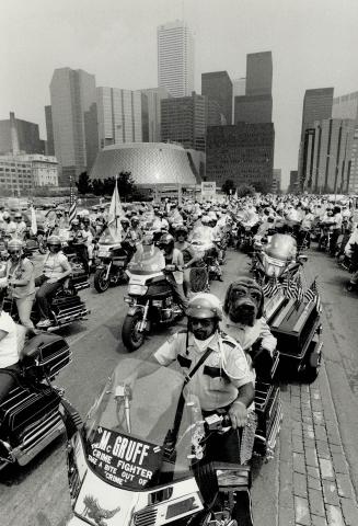 Blue Knights take to the streets, About 700 motorcycles driven by members of the Blue Knights from Canada and the U