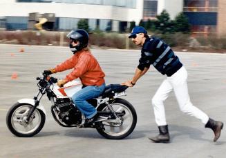 Humber safety centre trains bikers of tomorrow, Instructor George Reichert guides student Dorothy Barr at Humber College's Centre for Motorcyle Safety(...)