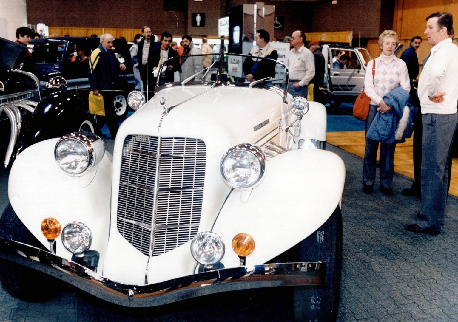 Classy chassis: You don't have to be in the market for a new car to enjoy the auto show, when there are cars like this supercharged Auburn speedster to admire