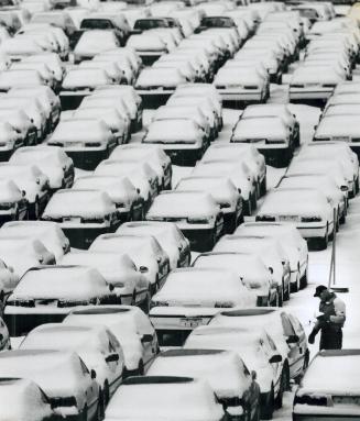 Snow Job, Todd Dolron searches for the right car under the snow at Hansen's Forwarding, an agent of CP Rall in Scarborough. About 100 of the 4,000 veh(...)