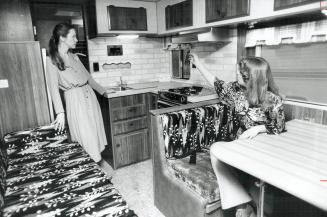 Gloria Stephenson (left) and Cherilyn Kaye inspect the interior of the Citation 24