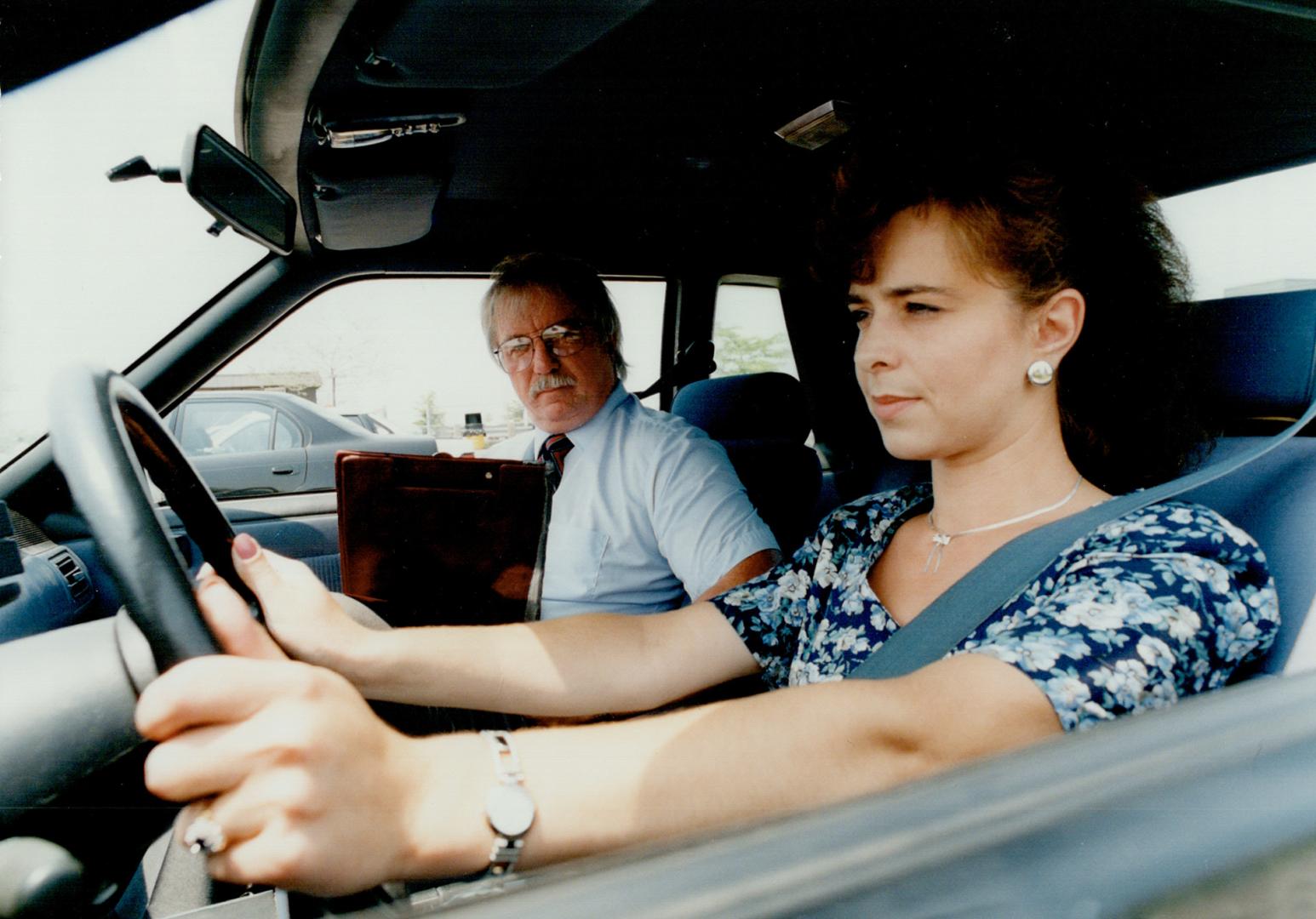 Driving Test: Sue Jovandin prepares for her driver's test with examiner Dan Worthy at John Rhodes Driver Education centre in Brampton