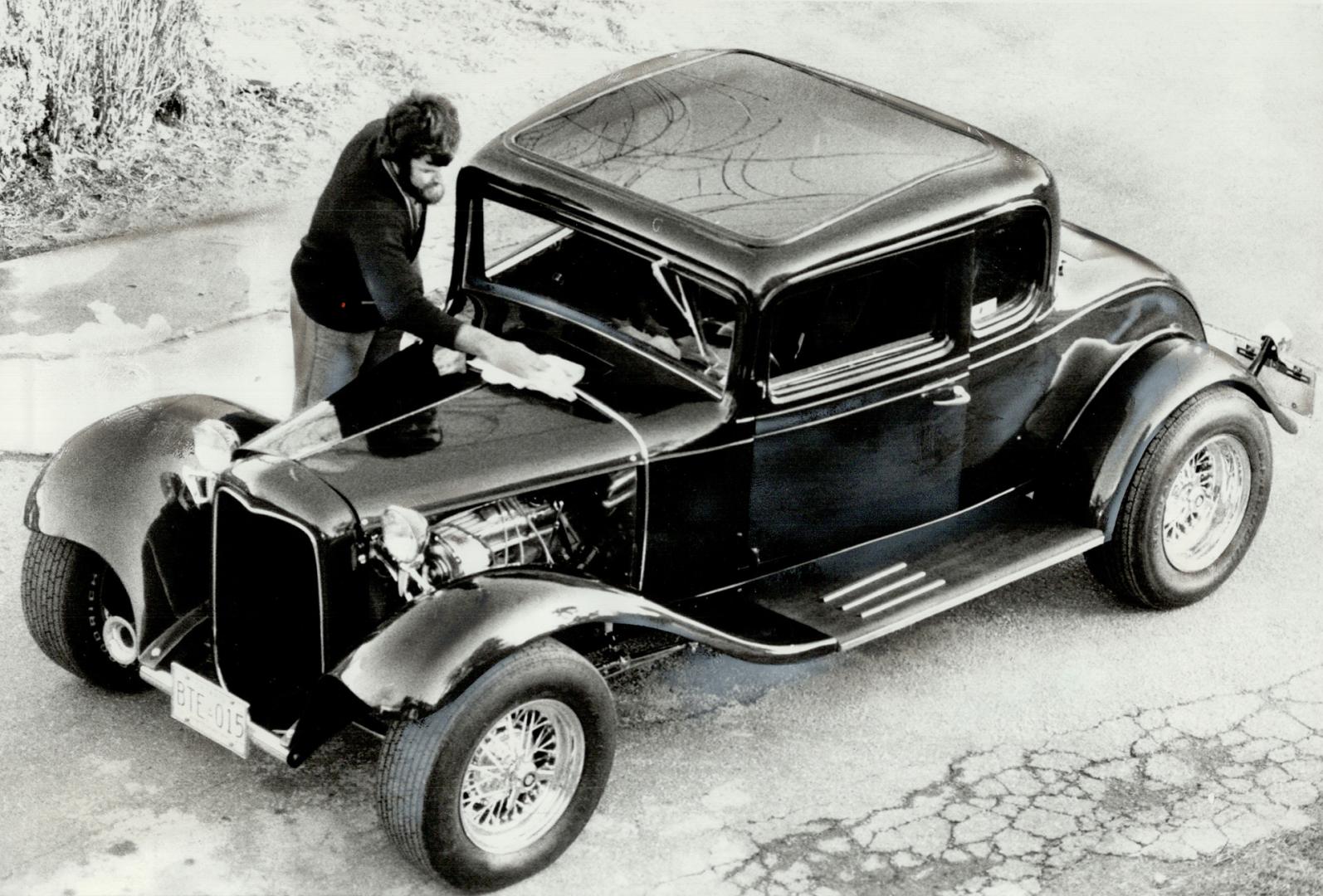 Loving polish is given to his restored 1932 Chevrolet five-window coupe by Reno DiRenza of Mississauga