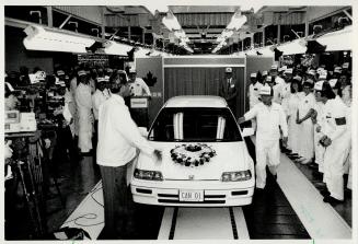 Big day at Honda's Alliston plant, A Special Edition model is driven off the line yesterday to mark the start of Civic Hatchback production at the All(...)