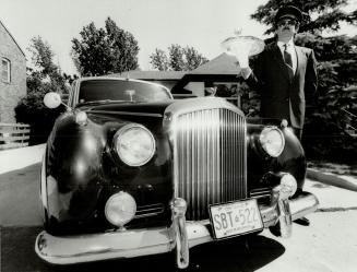 Home, James!: Buckingham Livery Service boasts a mint-condition fleet of vintage limos - including this plush '59 Bentley - and crack chauffeurs such as Warren Coates