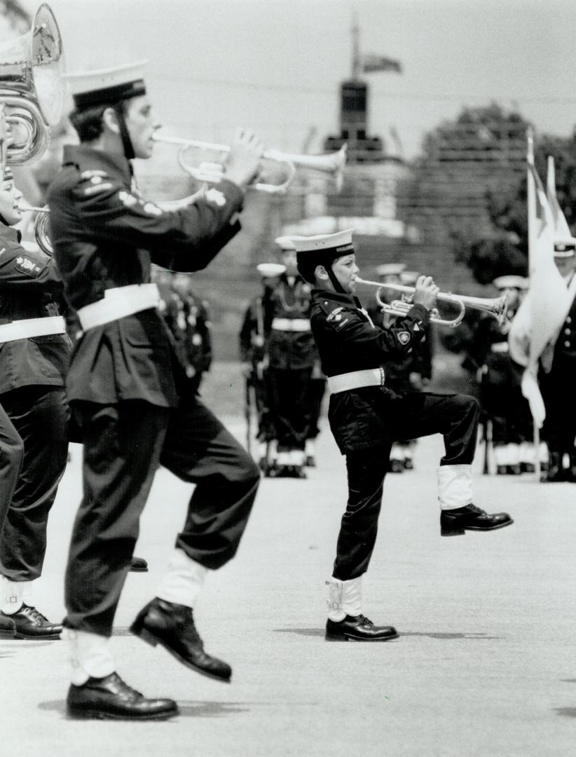 Cadets Salute Flag, Royal Canadian Sea Cadets march in front of HMCS Halda at Ontario Place yesterday in a ceremony to honor the flags of Canada. The (...)