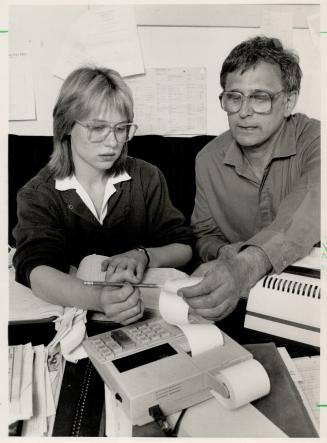 Busy: Futures participant Tammberlee Coupal, 16, demonstrates her book-keeping skills for Norman Antinoi