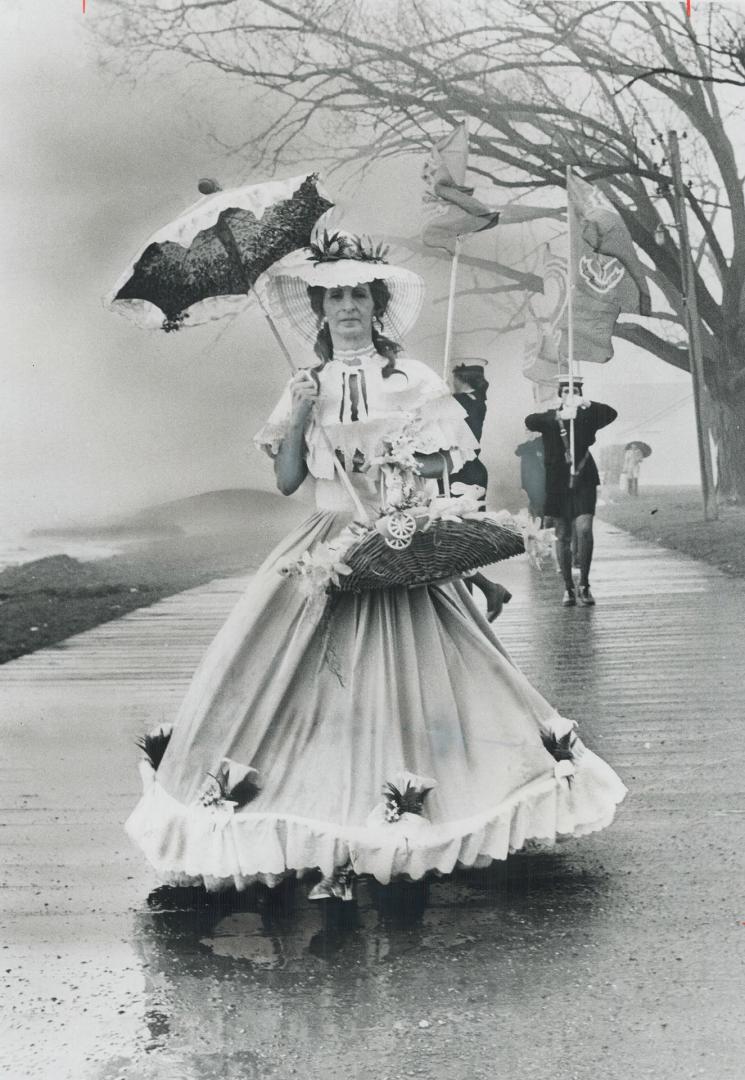 2,000 Brave showers to attend the Easter parade, Rain kept crowds to a minimum yesterday as approximately 2,000 turned out to watch the annual Easter (...)