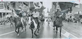 Leading the big grey cup parade along bloor st