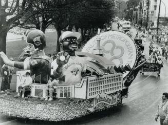 Hello from Metro, Metro's entry in Vancouver's Grey Cup parade yesterday boasts not only an Argonaut -- Albeit one eliminated from tomorrow's game by (...)