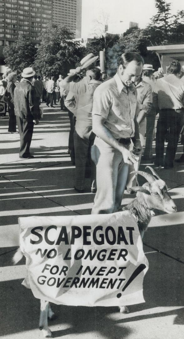 At mass rally for jobs in Nathan Phillips Square today before the start of the annual Labor Day parade to the CNE, the emblazoned goat of Jim Young, a(...)