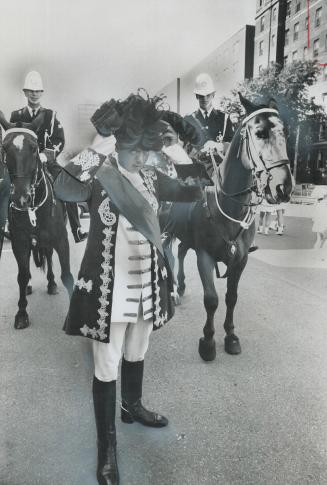 Dressed as William of orange, Constable Maurice Clarke prepared to lead today's Orange Walk, celebrating the 281st anniversary of the Battle of the Bo(...)