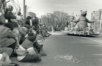 One of 21 floats in the parade wows the throng on University Ave