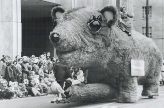 Bearing Rose Red and Snow White was easy for a big bruin in yesterday's parade