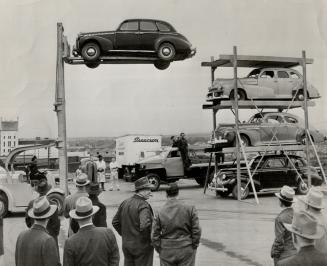 Parking problems in a lot of large cities may be solved by this ingenious device being demonstrated in Spokane, Wash